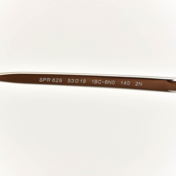 PRADA: Silver, Metal & Logo Sunglasses (po) - Picture 7 of 8